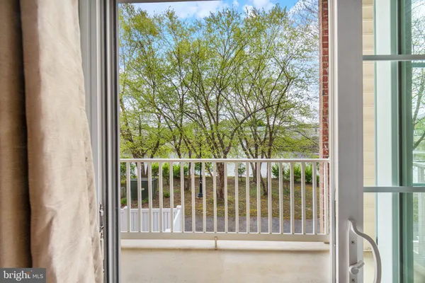 $325,000 | 2607 Chapel Lake Drive, Unit 107, Gambrills, MD 21054