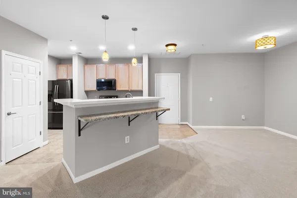 $325,000 | 2607 Chapel Lake Drive, Unit 107, Gambrills, MD 21054