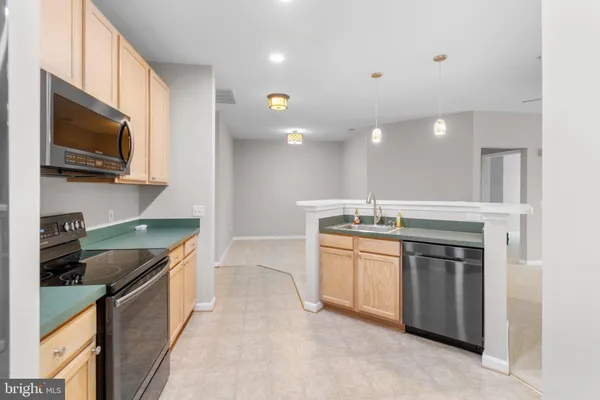 $325,000 | 2607 Chapel Lake Drive, Unit 107, Gambrills, MD 21054