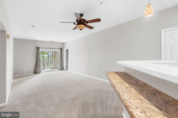 $325,000 | 2607 Chapel Lake Drive, Unit 107, Gambrills, MD 21054