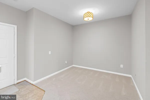 $325,000 | 2607 Chapel Lake Drive, Unit 107, Gambrills, MD 21054