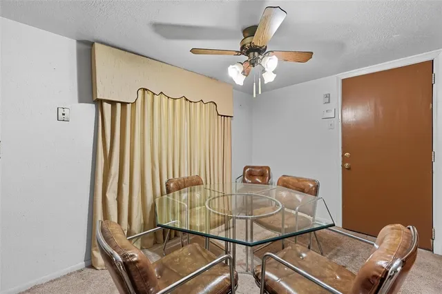 a view of a room with a chandelier