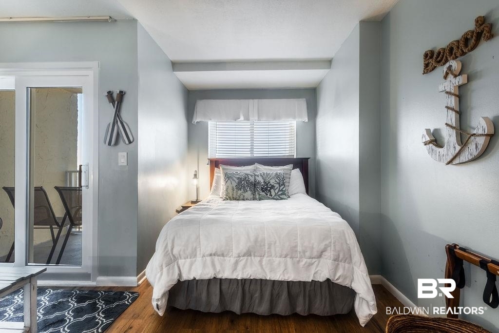 375 Plantation Road, Unit 5502 Gulf Shores, AL 36542 - Photo 9 of 27 A comfortable queen bed is featured along with a sofa sleeper for additional guests.