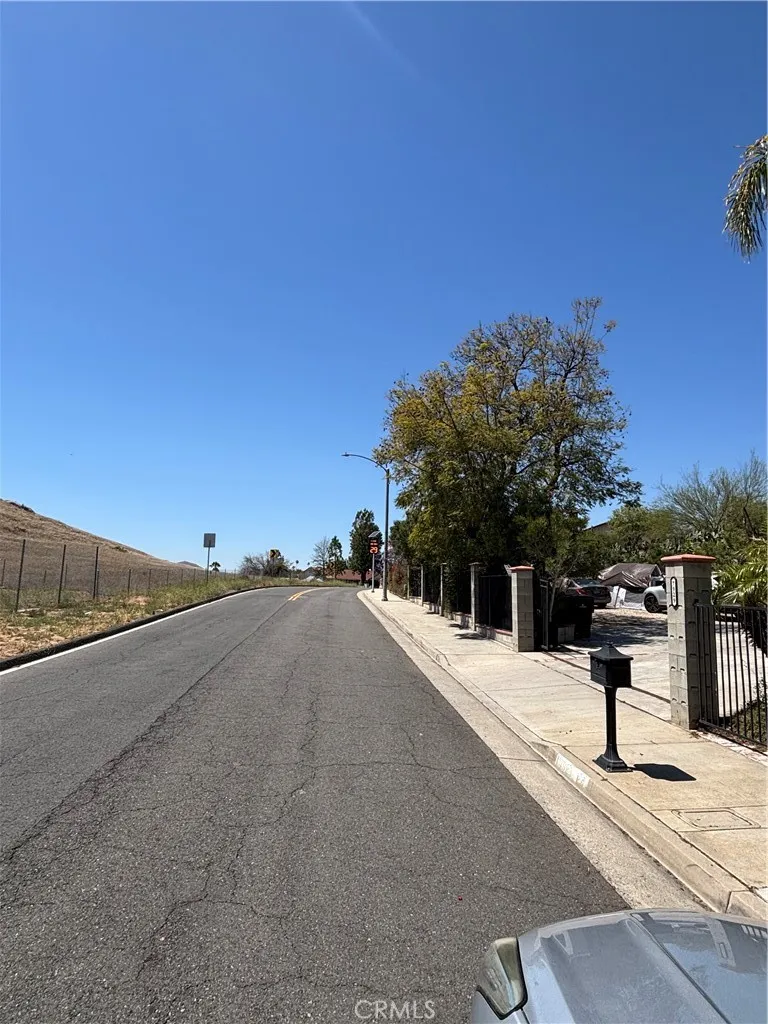 0 Bolton Avenue Riverside, CA 92505 - Photo 3 of 8 a street view with couple of cars parked on road