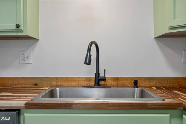 a view of a sink with a faucet