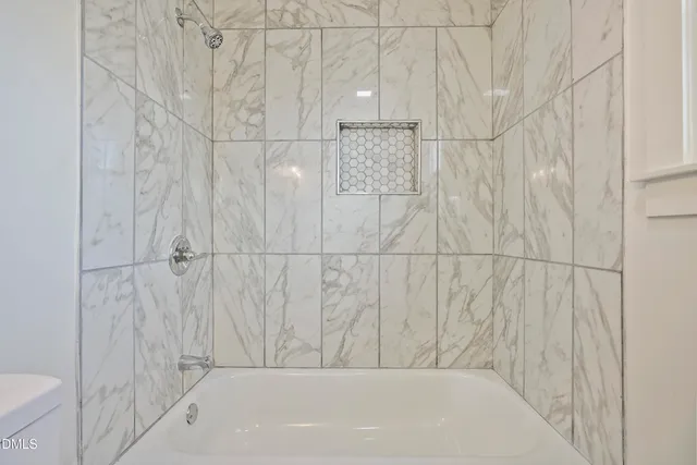 a bathroom with a bathtub