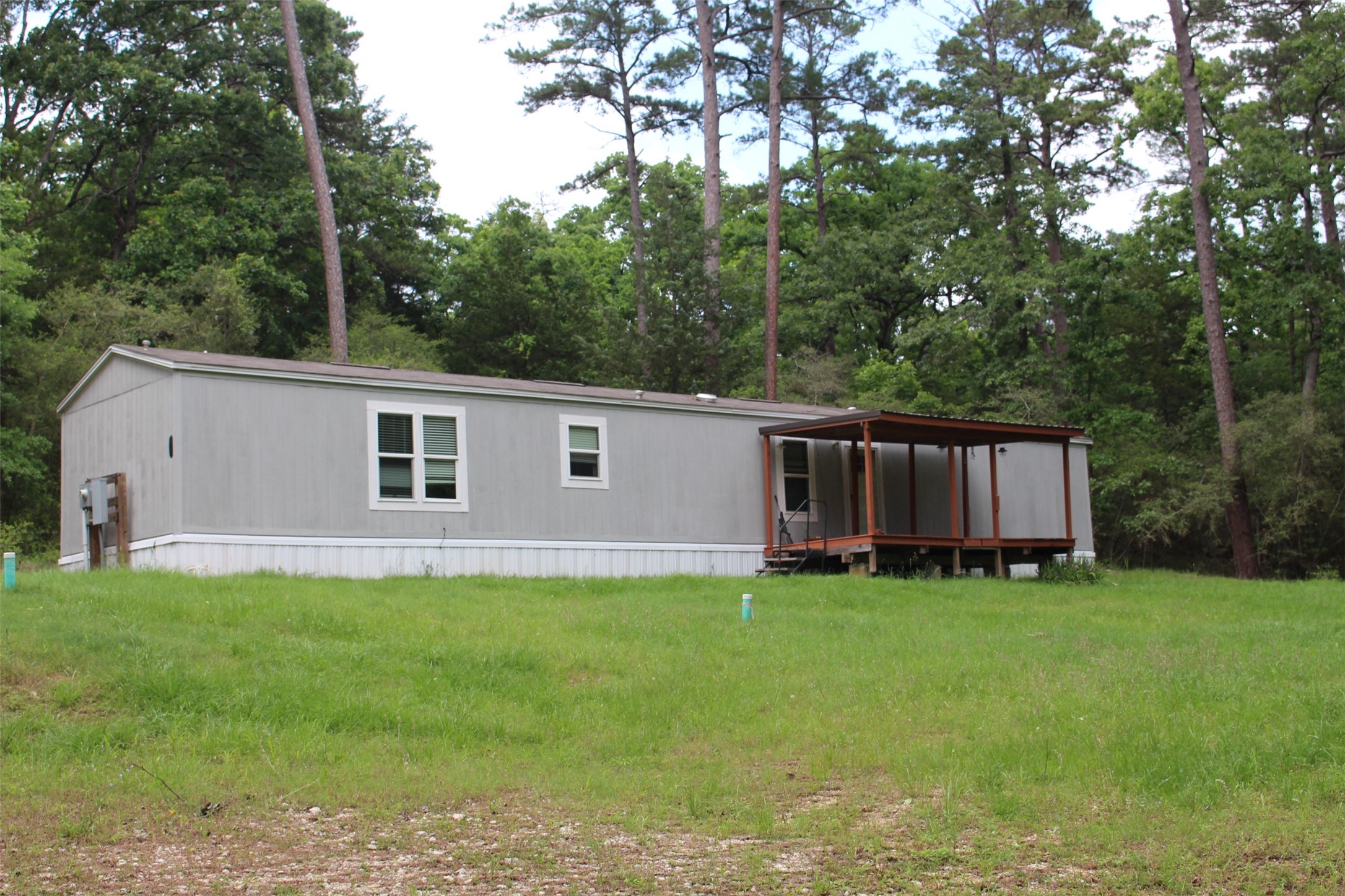 555 Beaver Run Grapeland, TX 75844 - Photo 21 of 21 a view of a house with a yard