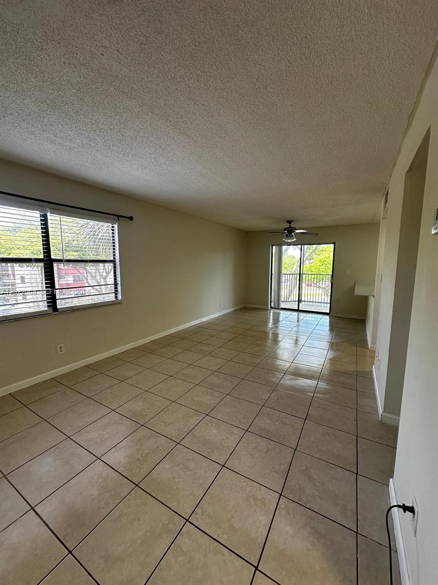 3400 Foxcroft Road, Unit 301 Miramar, FL 33025 - Photo 36 of 72 an empty room with windows