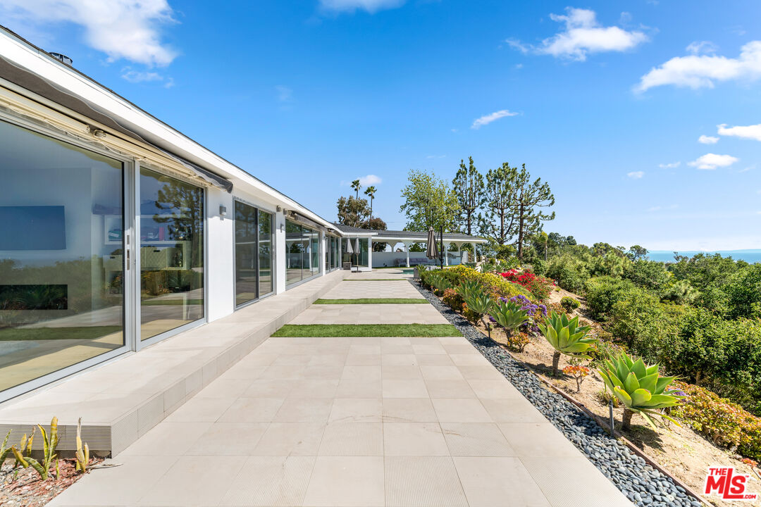 849 Glenmere Way Los Angeles, CA 90049 - Photo 43 of 51 a view of house with outdoor space