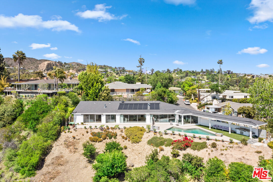 849 Glenmere Way Los Angeles, CA 90049 - Photo 50 of 51 a view of a city that has tall buildings