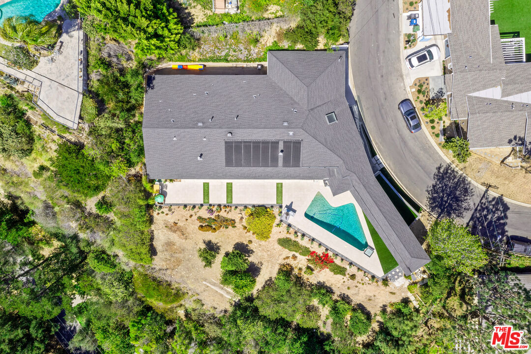 849 Glenmere Way Los Angeles, CA 90049 - Photo 51 of 51 an aerial view of a house with a yard and a large tree