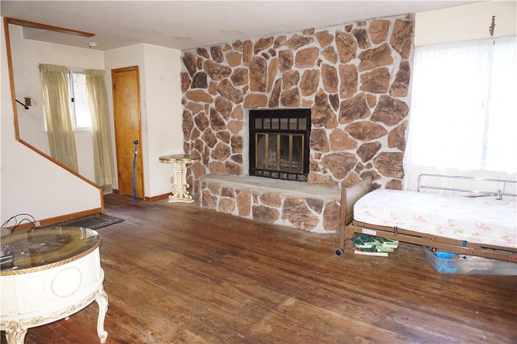 253 Byron Road Pittsburgh, PA 15237 - Photo 12 of 16 Wood burning fireplace that matches the exterior stone.
