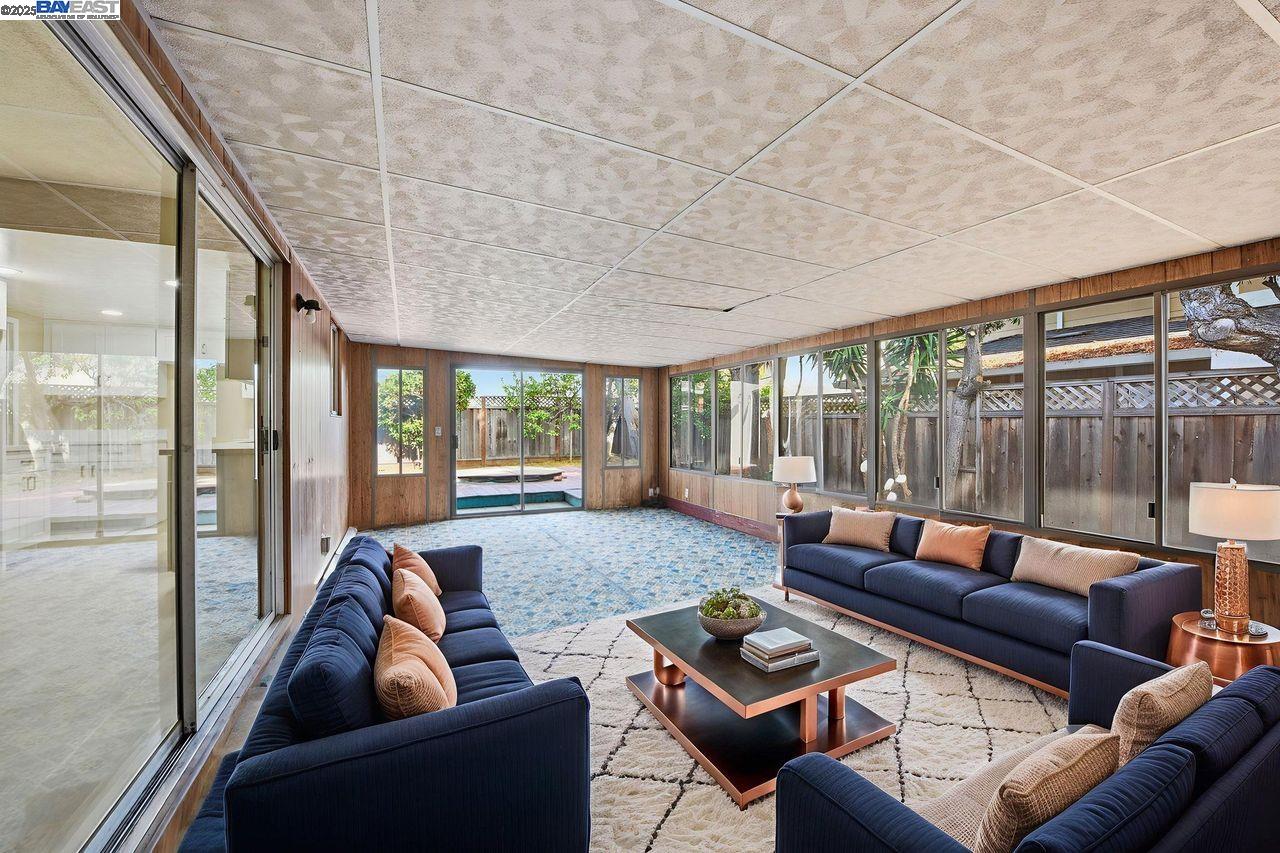 14544 Tiburon Road San Leandro, CA 94577 - Photo 12 of 26 a living room with furniture and a large window