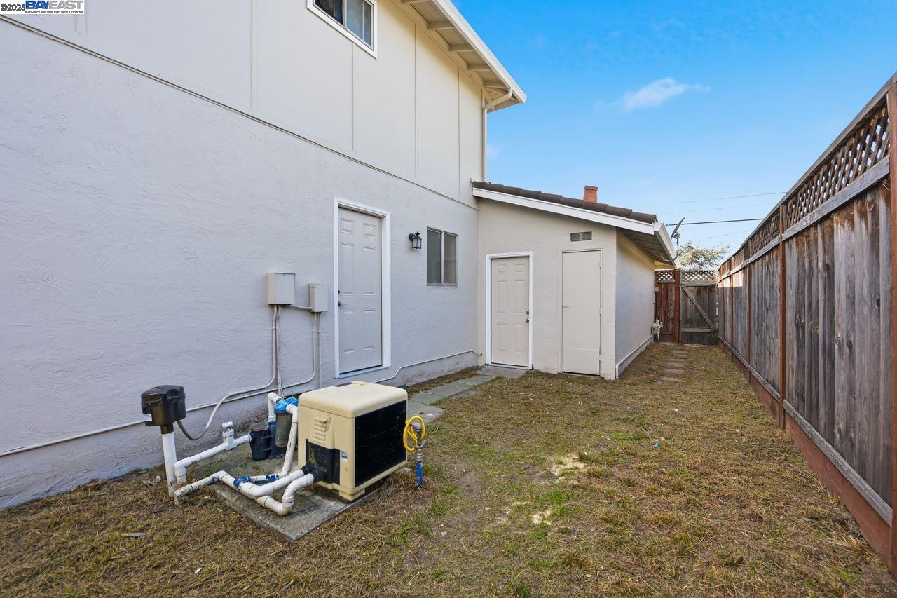 14544 Tiburon Road San Leandro, CA 94577 - Photo 26 of 26 a backyard of a house with table and chairs