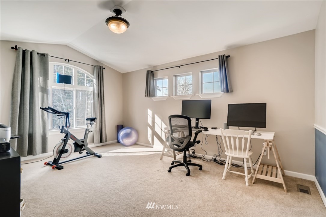 4121 223rd Place Southeast Bothell, WA 98021 - Photo 14 of 15 a view of a workspace with furniture and a window