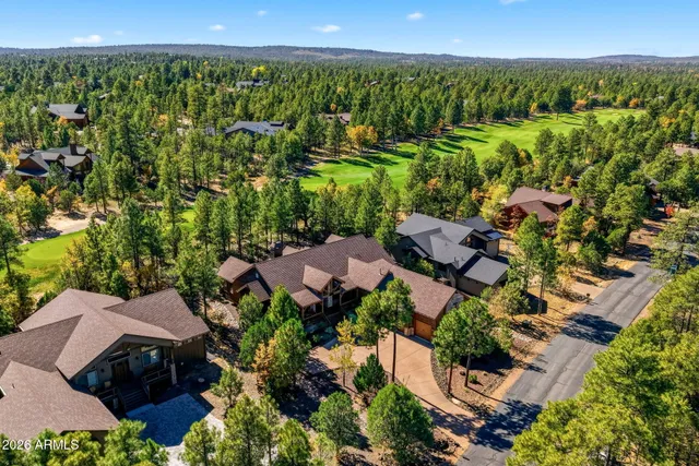 a view of a kitchen next to a window