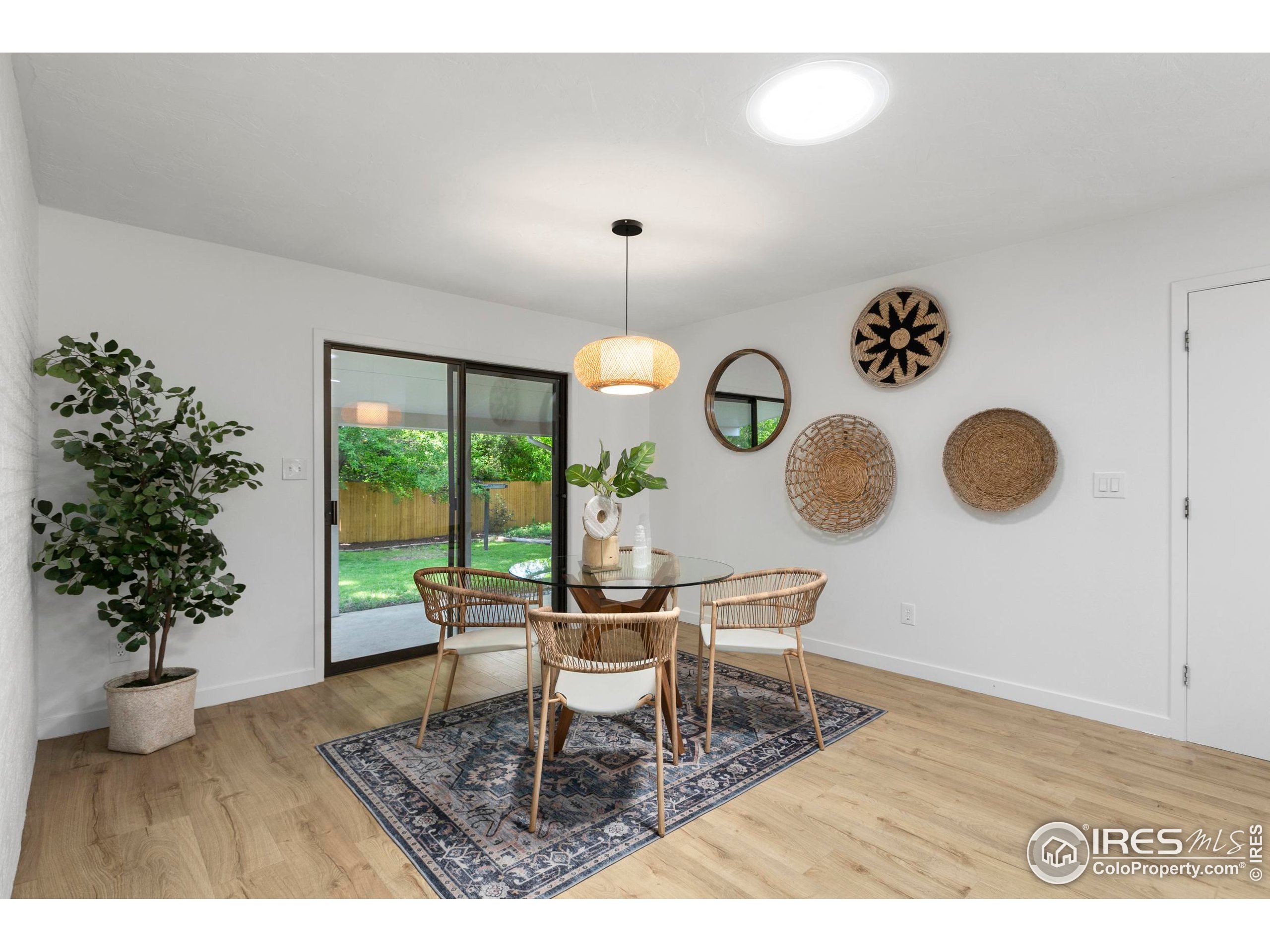 1917 South Lemay Avenue Fort Collins, CO 80525 - Photo 17 of 50 a dining room with a table and chairs