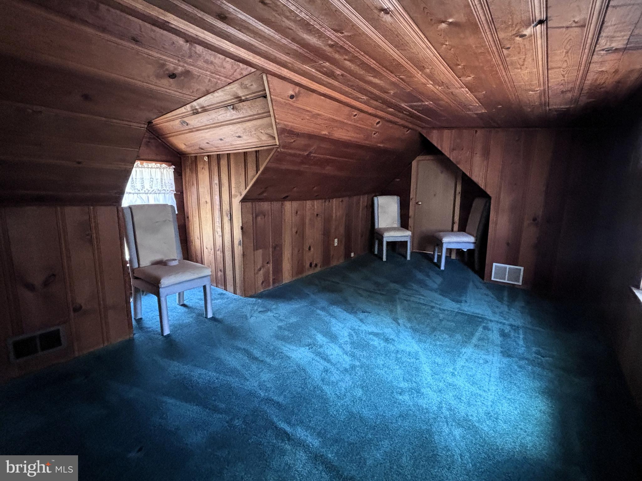 253 Hopewell Road Medford, NJ 08055 - Photo 32 of 50 a view of a room with wooden walls and stairs