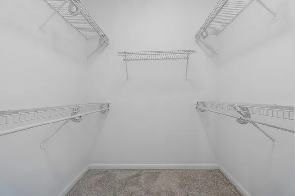 a view of a room with racks on the wall