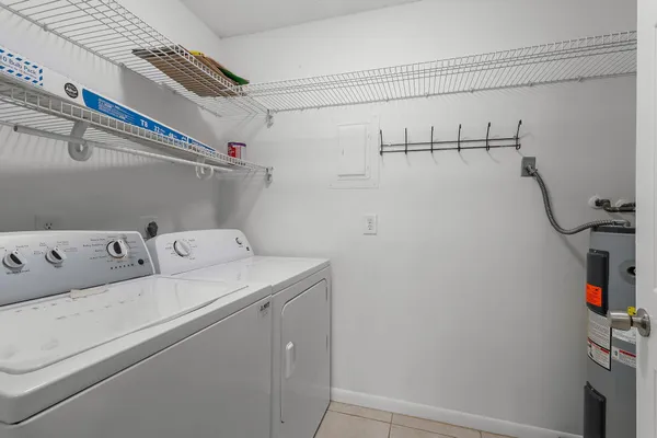 a utility room with dryer and washer