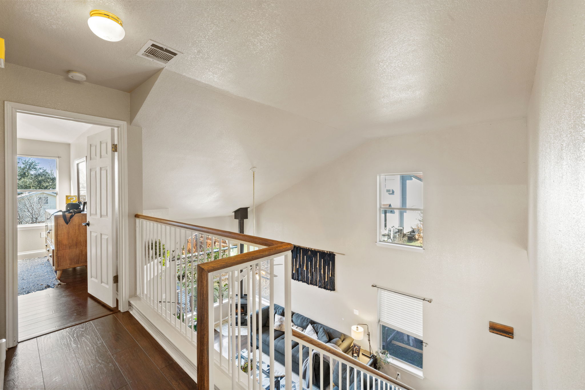 17536 Bishopsgate Drive Pflugerville, TX 78660 - Photo 16 of 28 Corridor with dark wood-type flooring