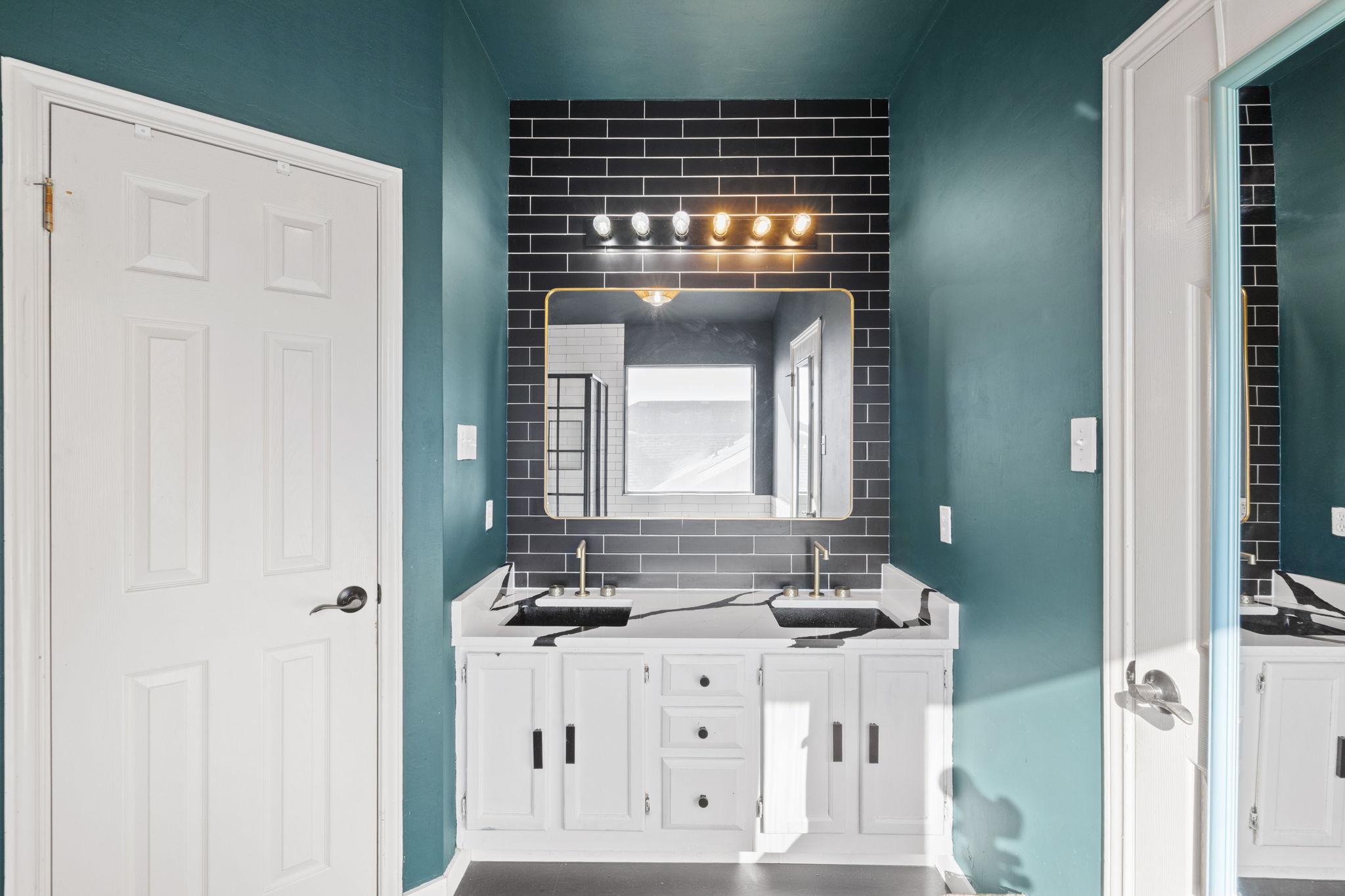 17536 Bishopsgate Drive Pflugerville, TX 78660 - Photo 20 of 35 Bathroom with double vanity and decorative backsplash