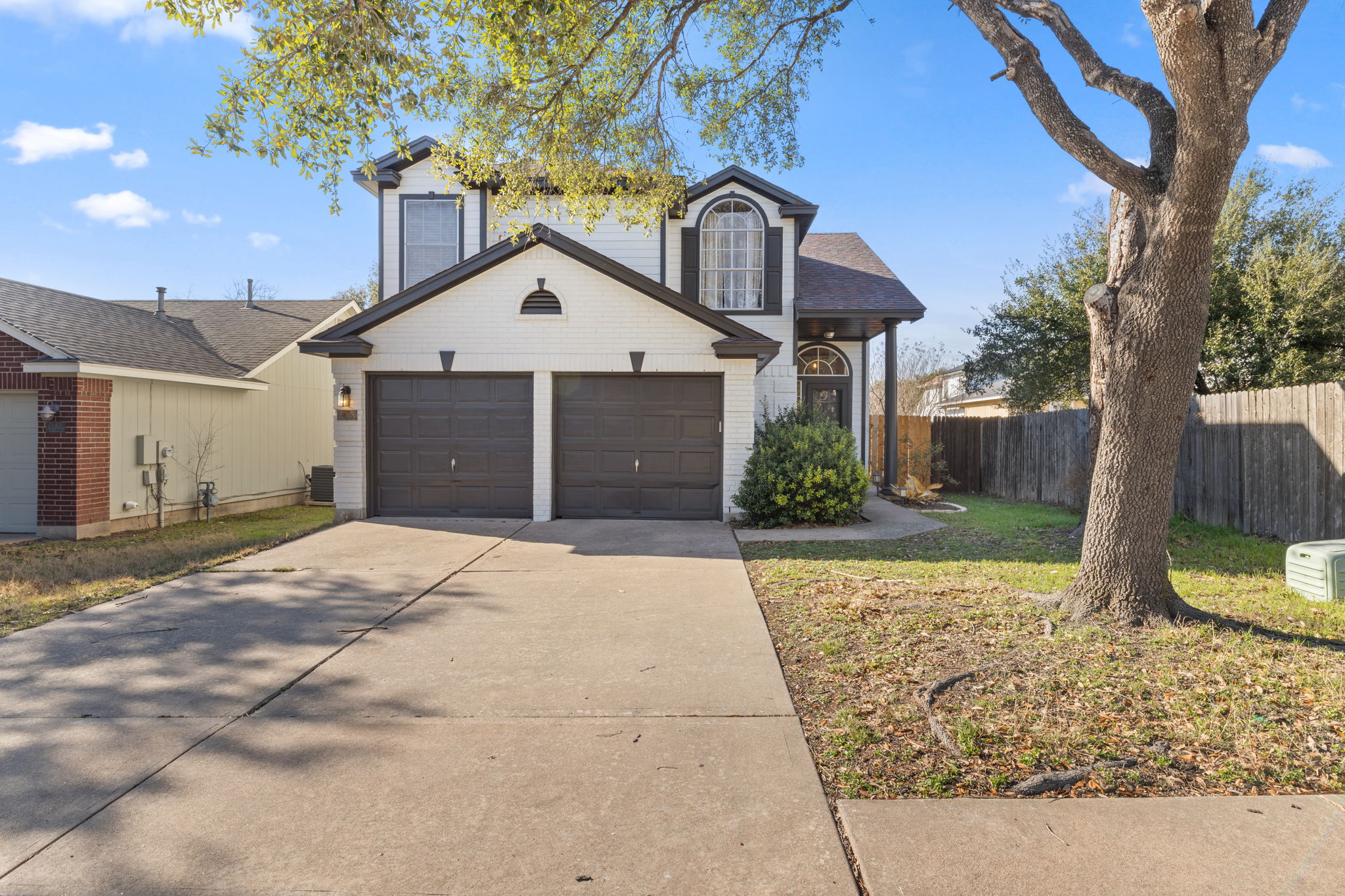 17536 Bishopsgate Drive Pflugerville, TX 78660 - Photo 2 of 35 Traditional home with concrete driveway and an attached garage