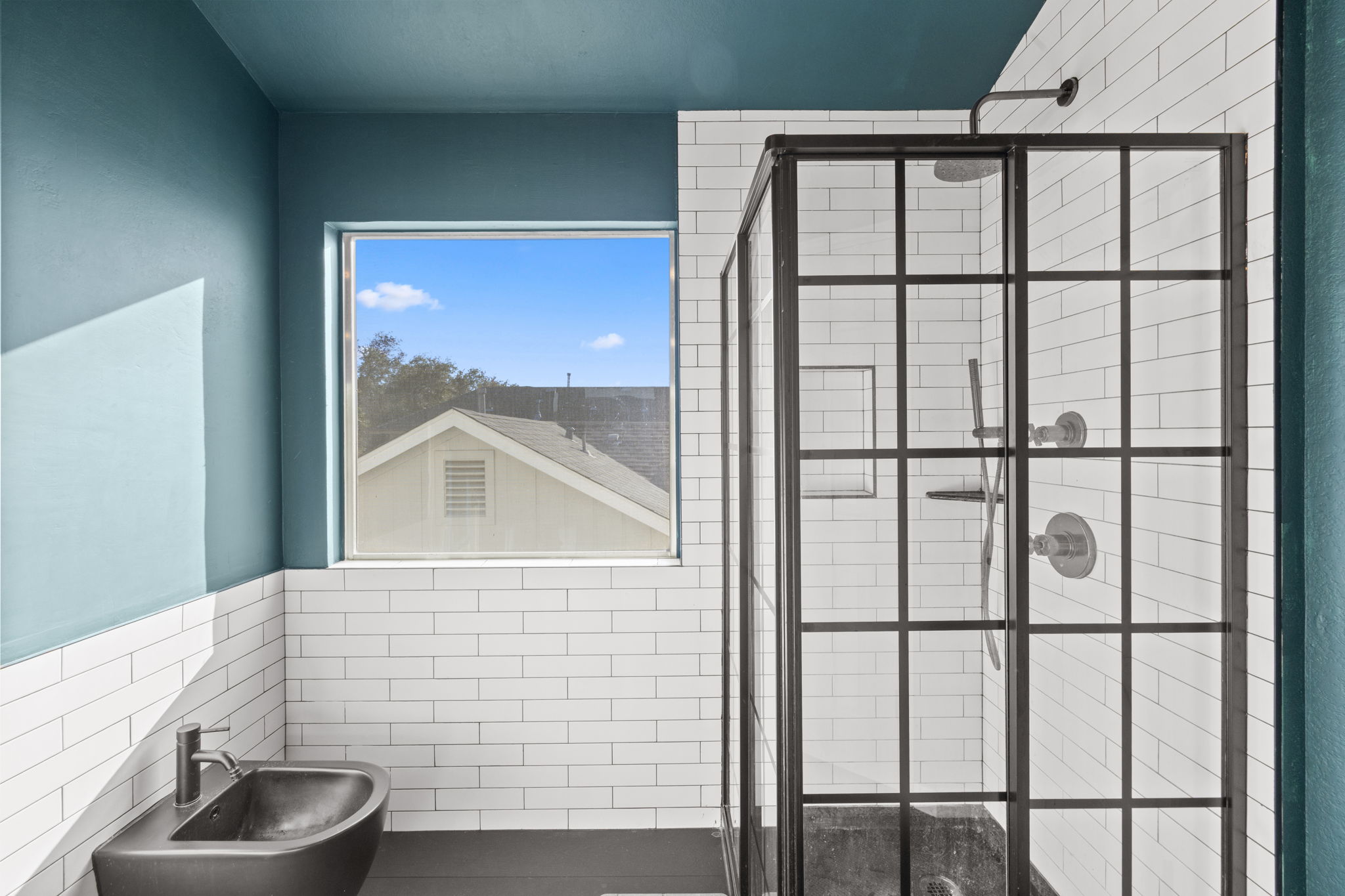 17536 Bishopsgate Drive Pflugerville, TX 78660 - Photo 21 of 35 Bathroom featuring tile walls and a stall shower