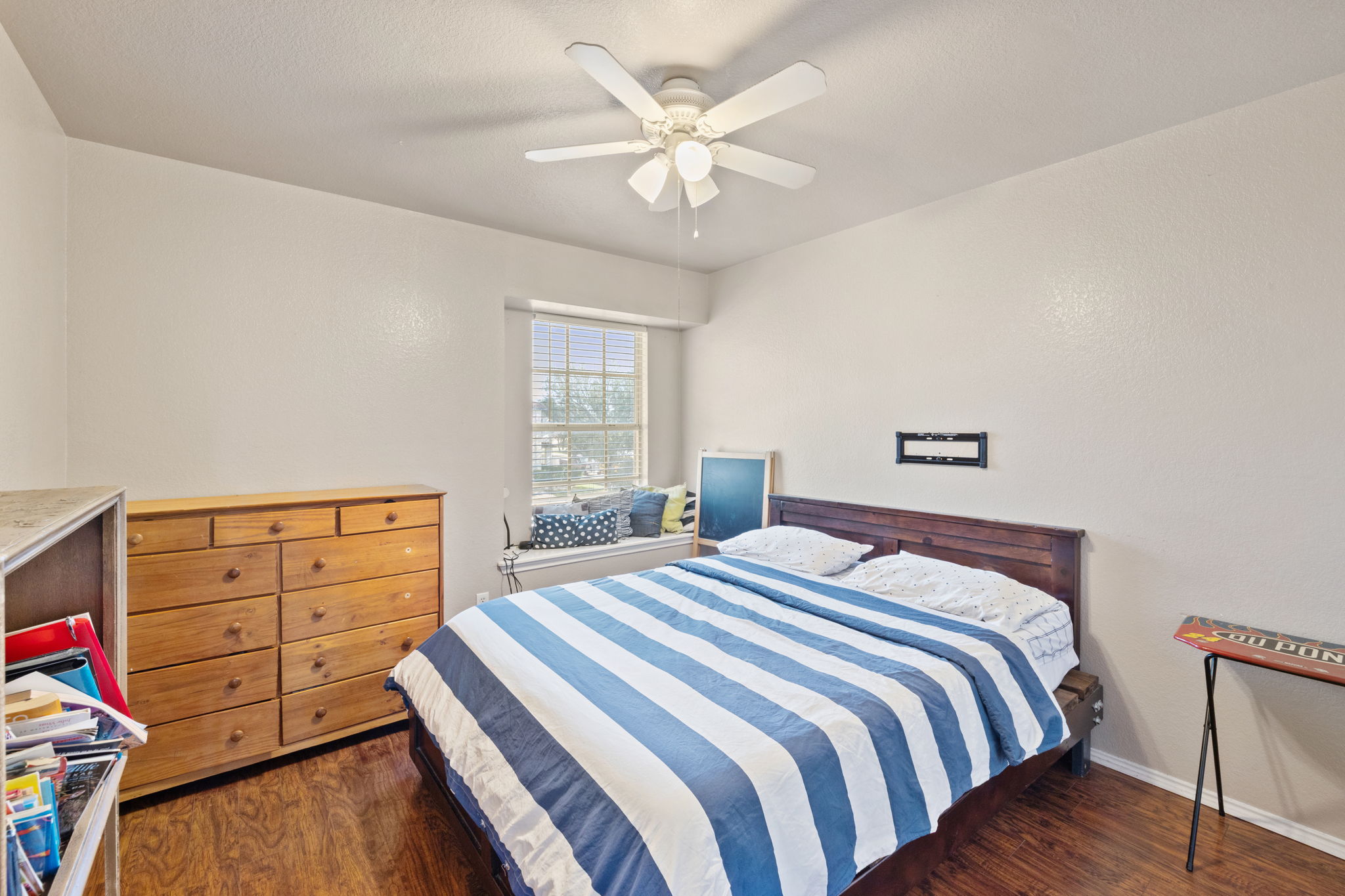 17536 Bishopsgate Drive Pflugerville, TX 78660 - Photo 24 of 35 Bedroom featuring dark wood-style flooring and ceiling fan