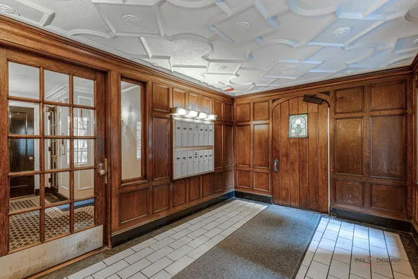 a room with a black white checkered floor