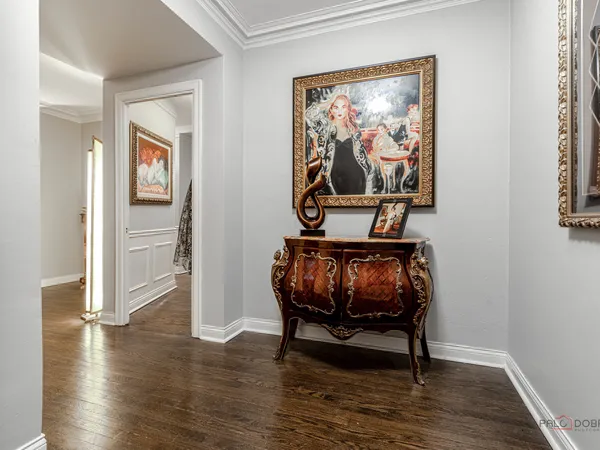 a living room with lots of furniture and a table