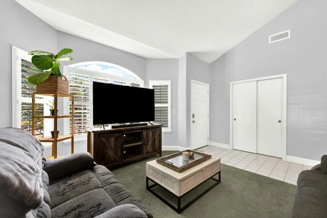 a view of a dining room with furniture window and outside view