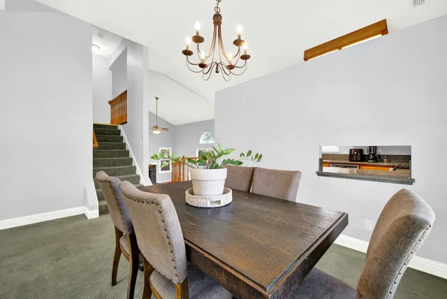 a kitchen with stainless steel appliances granite countertop a stove cabinets and a sink