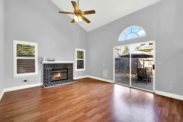 a bathroom with a sink a mirror a toilet and shower
