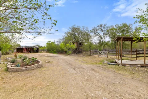 a view of a lake with a big yard