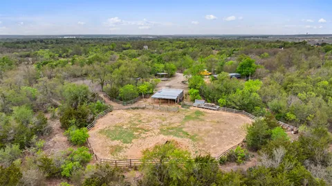 an aerial view of a house with a garden