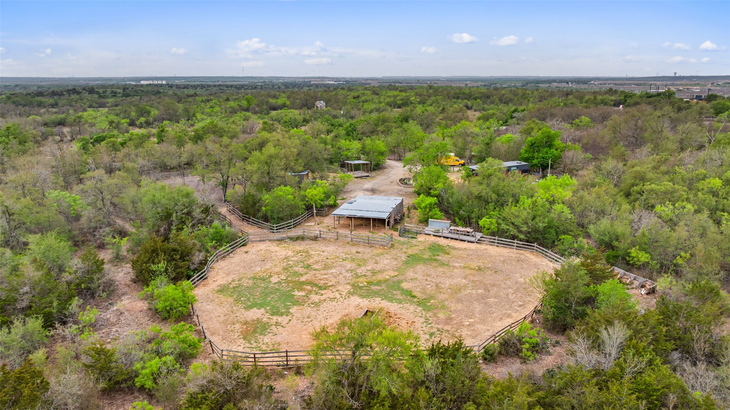 9426 Bock Road Buda, TX 78610 - Photo 3 of 33 A cleared tournout pen is ready for your horses.