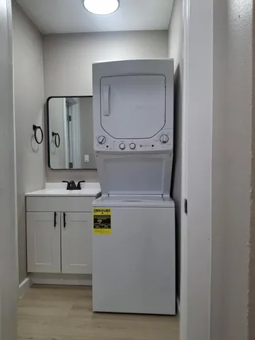 a utility room with washer and dryer