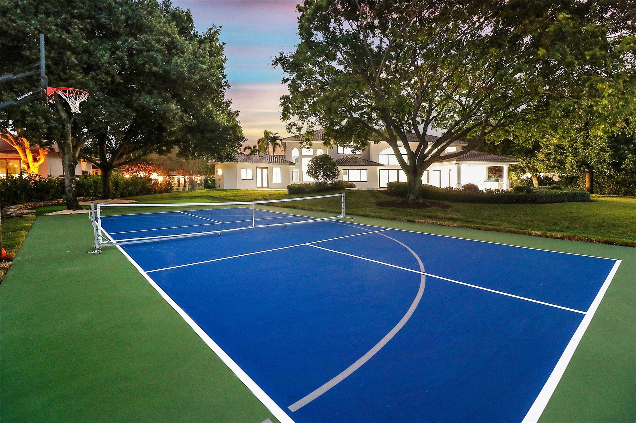 10303 Southwest 26th Street Davie, FL 33324 - Photo 3 of 42 a view of a tennis court