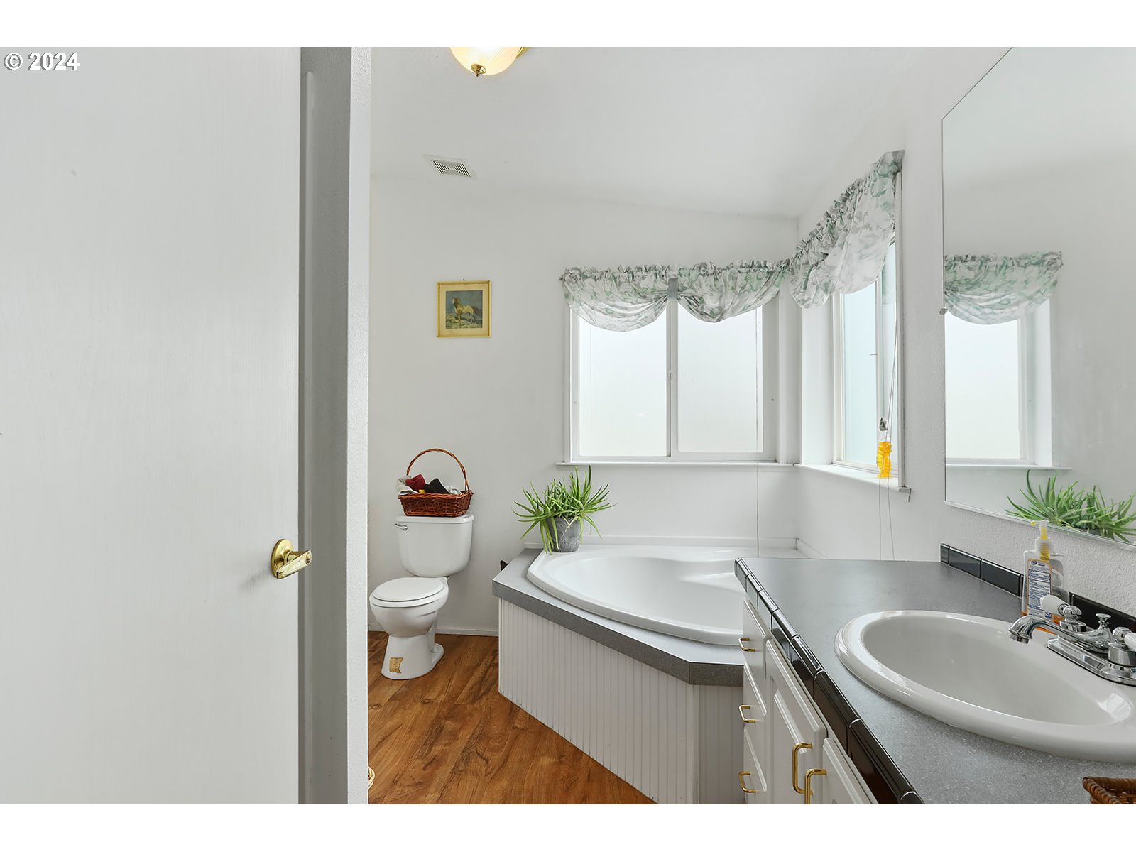 1206 Highway 197 Maupin, OR 97037 - Photo 15 of 31 a bathroom with a granite countertop sink and a large mirror