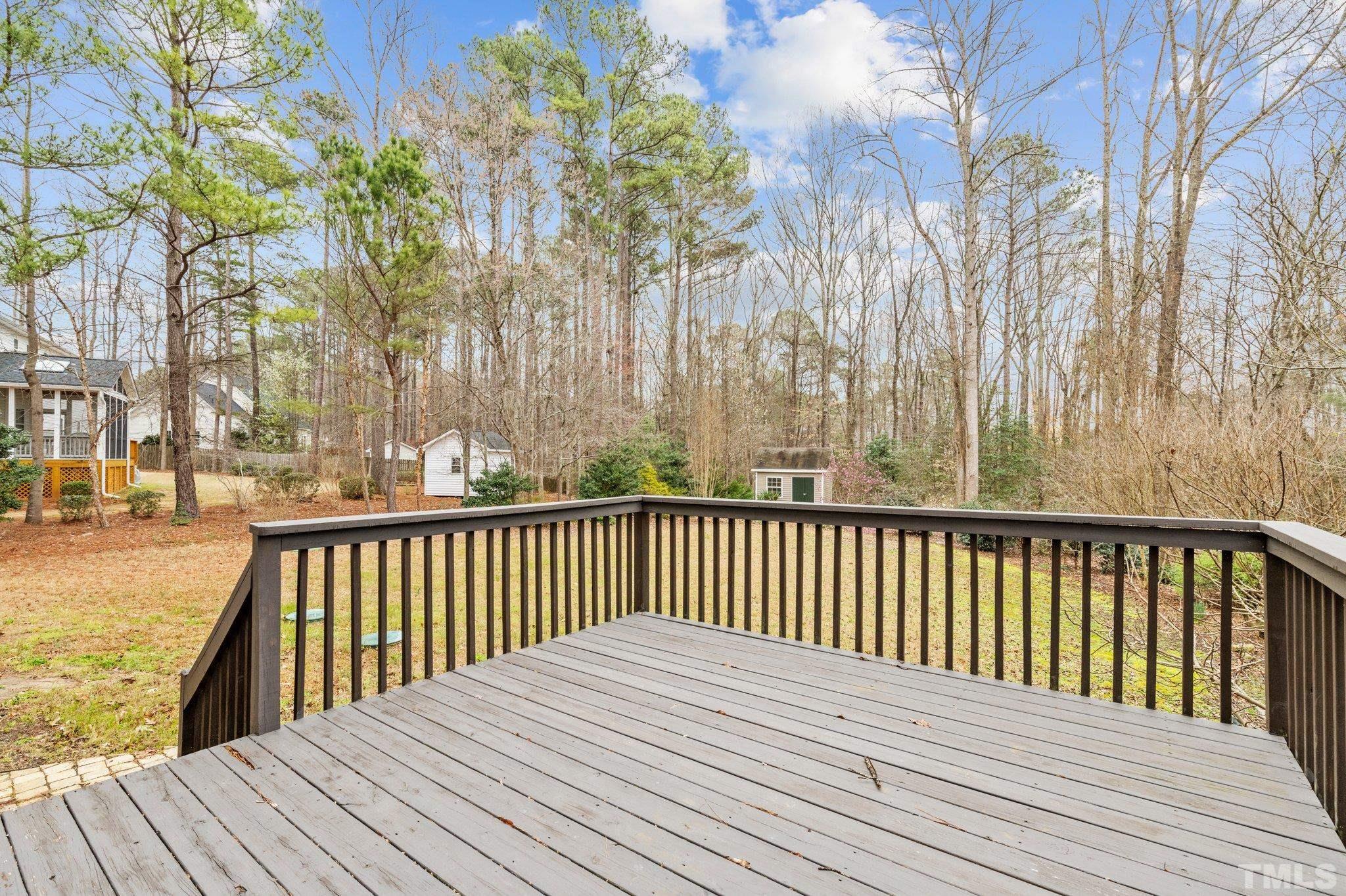 1413 Shady Rise Glen Raleigh, NC 27603 - Photo 20 of 39 a view of wooden deck