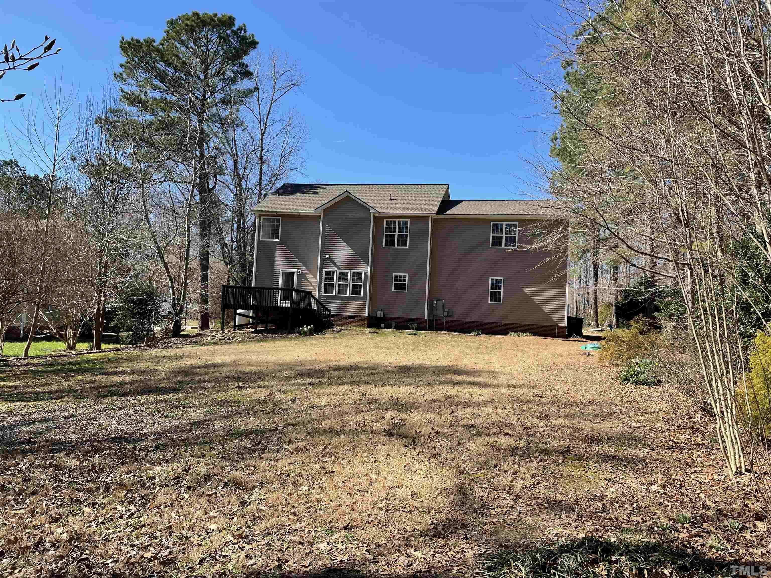 1413 Shady Rise Glen Raleigh, NC 27603 - Photo 5 of 39 a view of a house with a yard