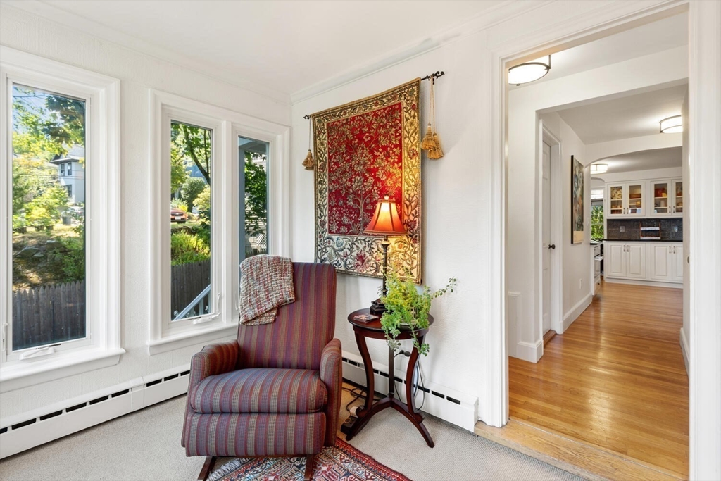 8 Monadnock Road Arlington, MA 02476 - Photo 16 of 37 a living room with furniture and a gate