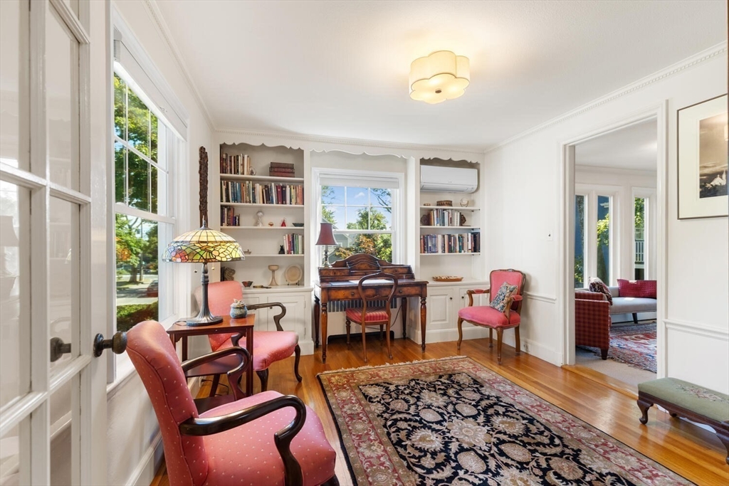 8 Monadnock Road Arlington, MA 02476 - Photo 17 of 37 a living room with furniture and a window