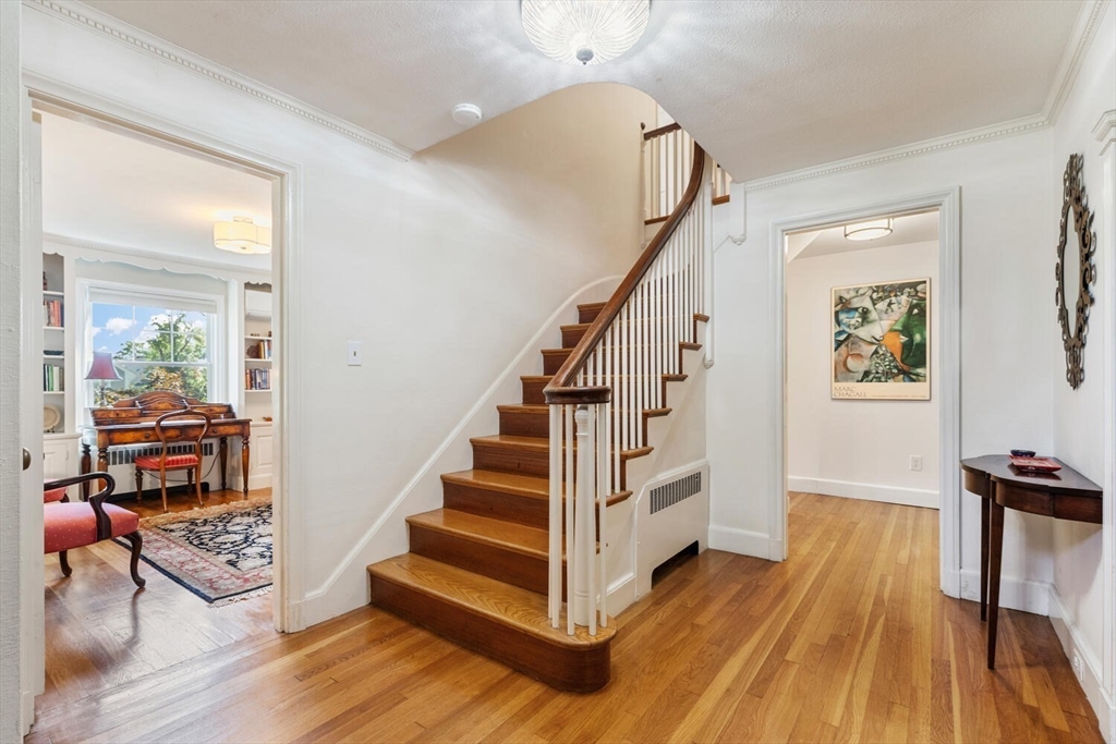 8 Monadnock Road Arlington, MA 02476 - Photo 19 of 37 a view of entryway and hall with wooden floor