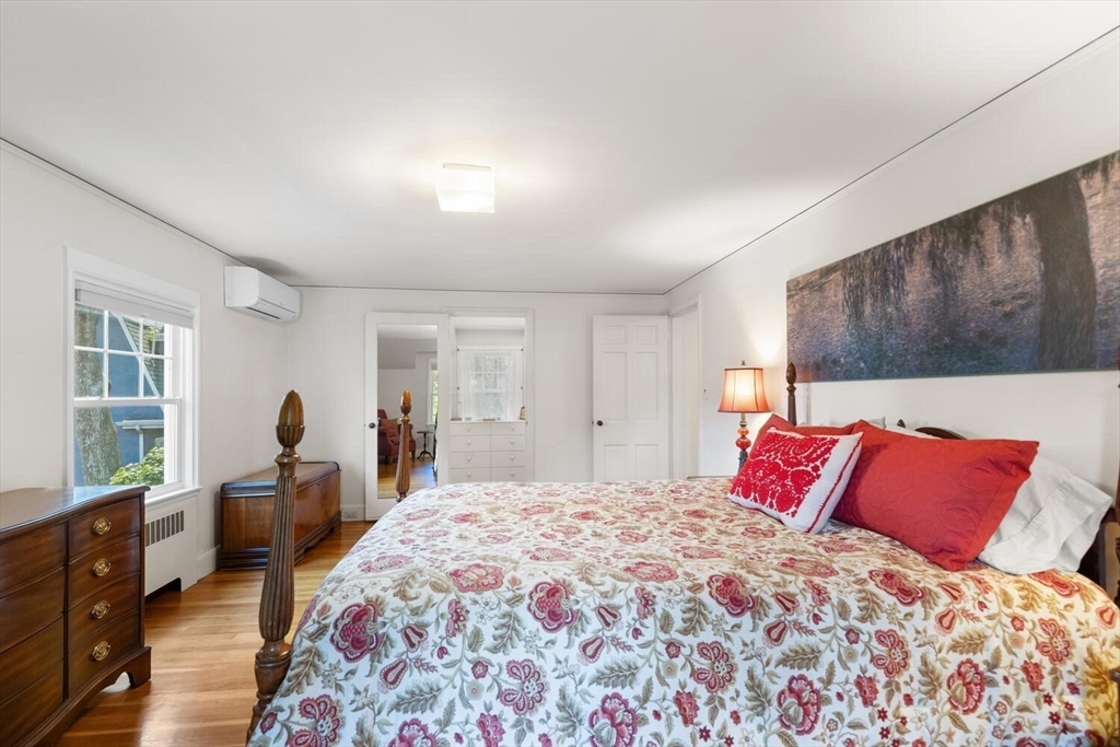 8 Monadnock Road Arlington, MA 02476 - Photo 20 of 37 a bedroom with a large bed and a window