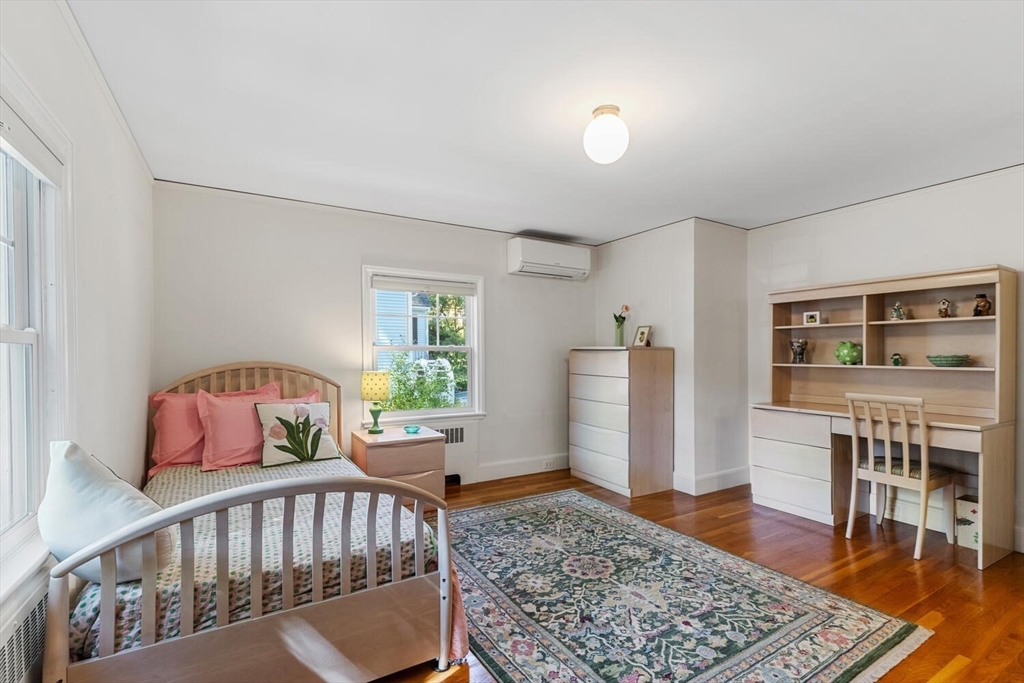 8 Monadnock Road Arlington, MA 02476 - Photo 26 of 37 a bedroom with furniture and a rug