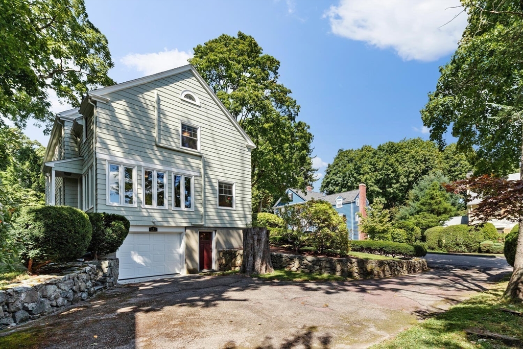 8 Monadnock Road Arlington, MA 02476 - Photo 32 of 37 a front view of a house with a yard