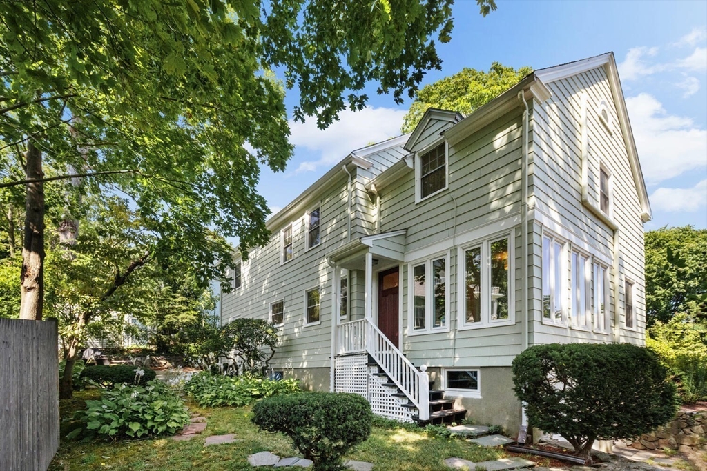 8 Monadnock Road Arlington, MA 02476 - Photo 33 of 37 a view of a house with a garden