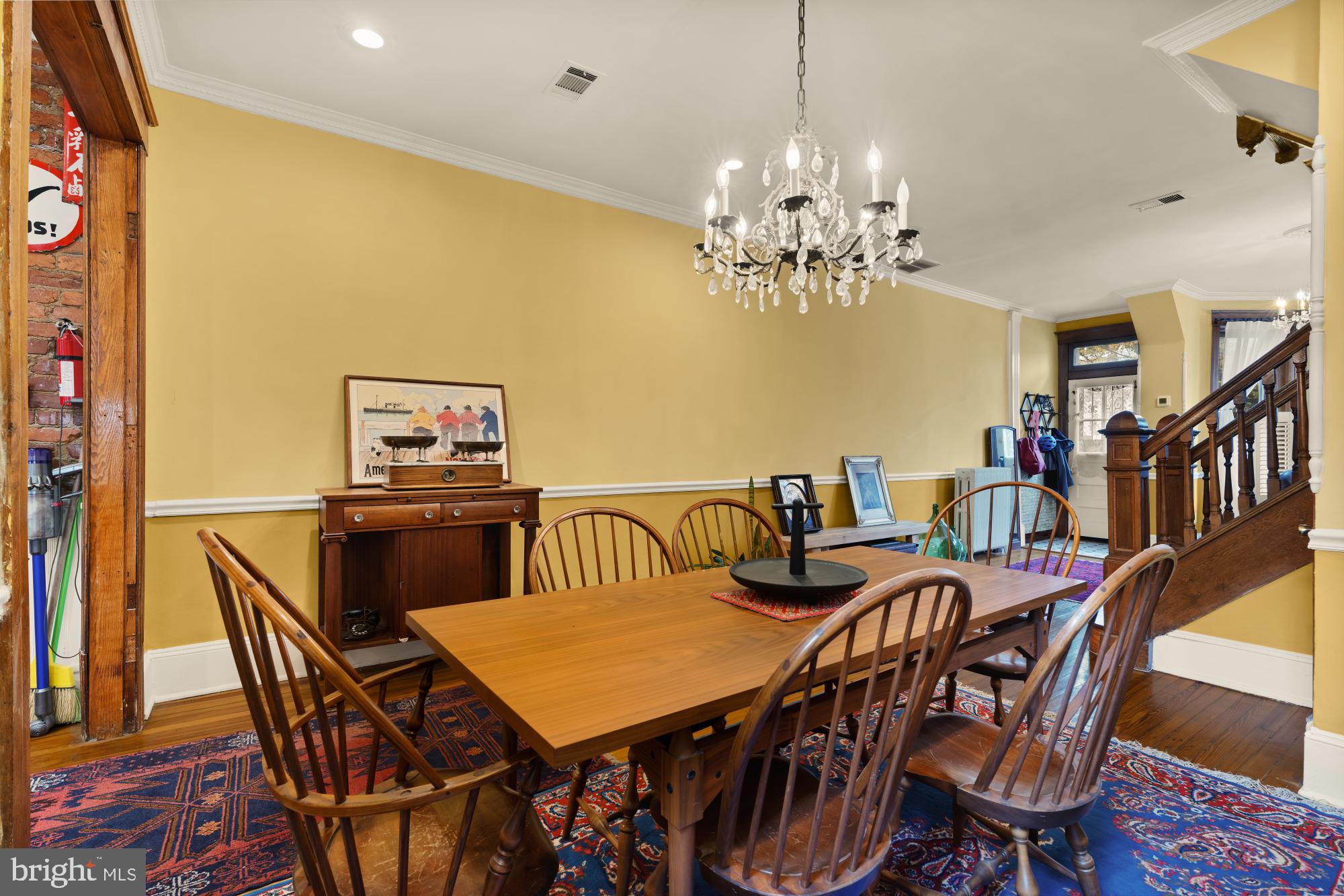 543 11th Street Southeast Washington, DC 20003 - Photo 12 of 41 a view of a dining room with furniture and chandelier
